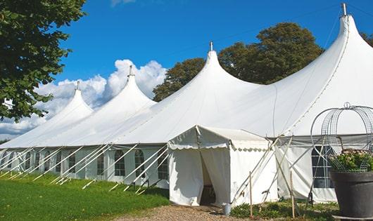 portable toilets equipped for hygiene and comfort at an outdoor festival in Avon